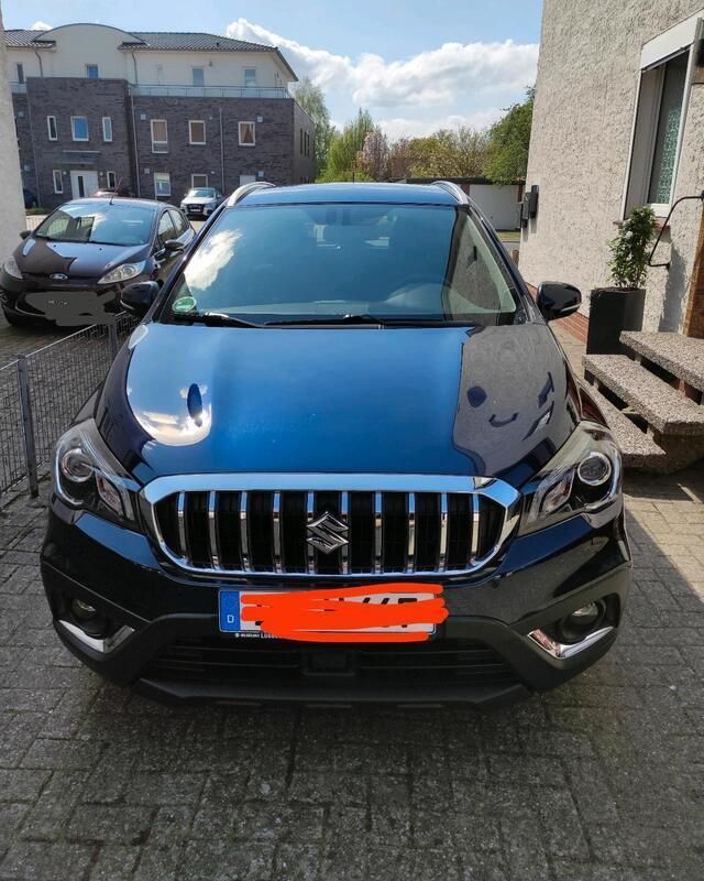 Blau Gebraucht 2021 Suzuki SX4 Comfort SUV | 18.000 € - Bild 1/4