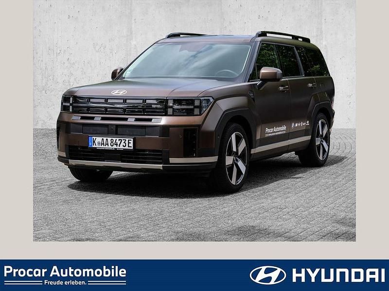 Earthy brass / mat Gebraucht 2025 Hyundai Santa Fe Signature SUV | 49.950 € - Bild 1/4