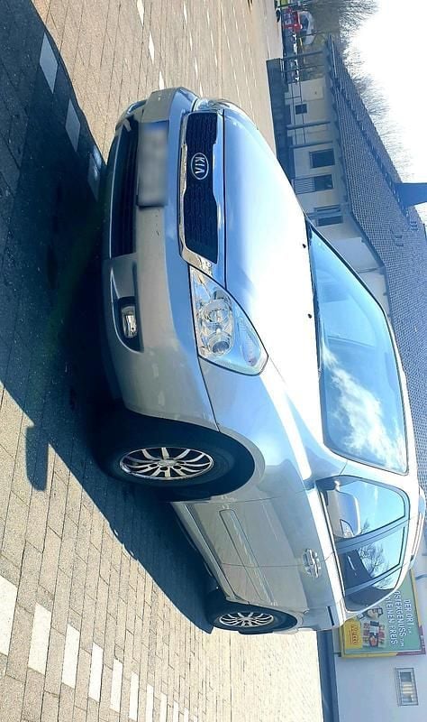 Gebraucht Kia Carnival 192 PS (141 kW) 2012 Grau Van / Kleinbus