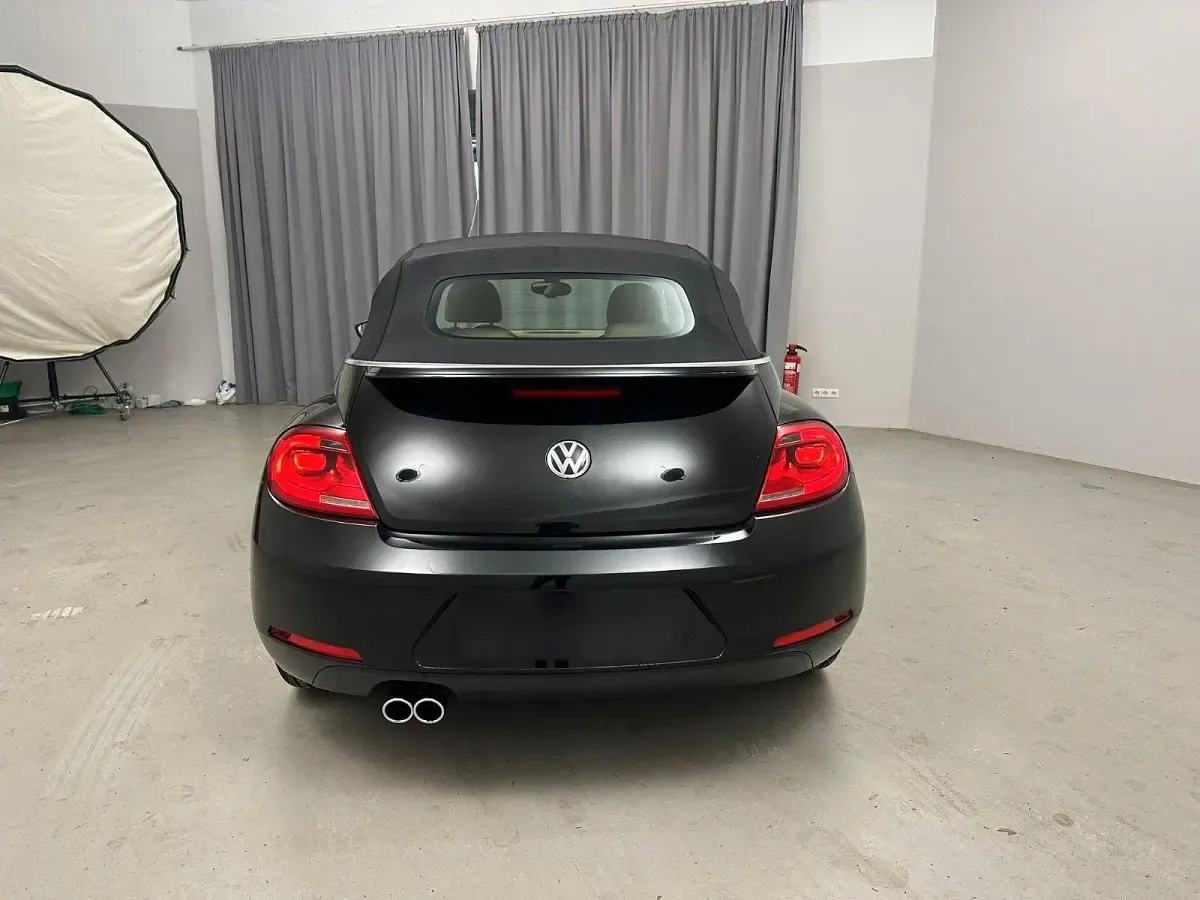 Używany VW Beetle Exclusive 140 KM (102 kW) 2014 Czarny Hatchback