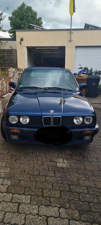 Blau Gebraucht 1993 BMW 320 Cabriolet Performance Cabrio | 12.900 € - Bild 1/4