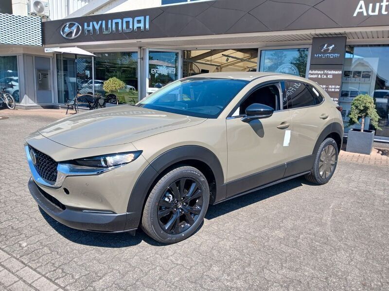 Braun Neu 2025 Mazda CX-30 Homura-Line SUV | 30.390 € - Bild 1/4