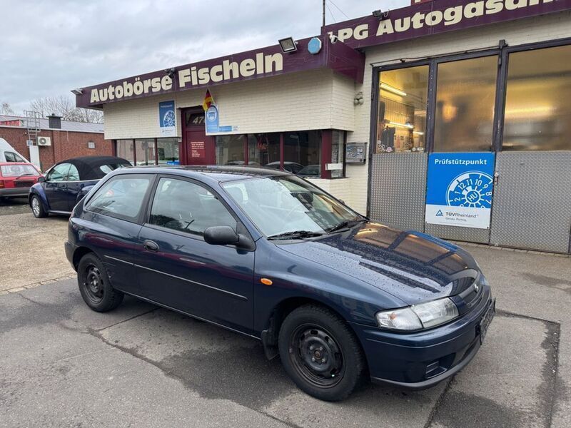Blau Gebraucht 1997 Mazda 323C Limousine | 1.499 € - Bild 1/4