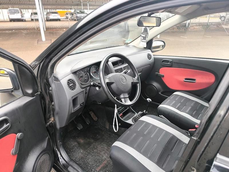 Gebraucht Daihatsu Cuore 53 PS (38 kW) 2006 Schwarz Kleinwagen