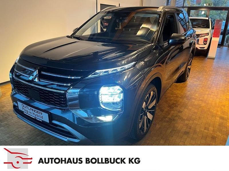 Grau Neu 2025 Mitsubishi Outlander P-HEV Edition SUV | 51.900 € (Fairer Preis) - Bild 1/4