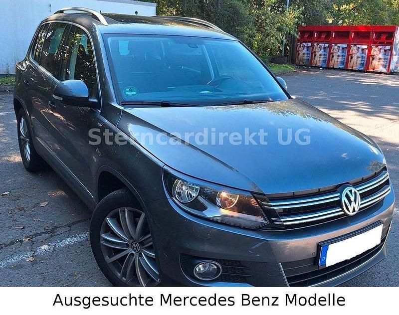 Grau Gebraucht 2014 VW Tiguan Sportline SUV | 13.600 € (Fairer Preis) - Bild 1/4