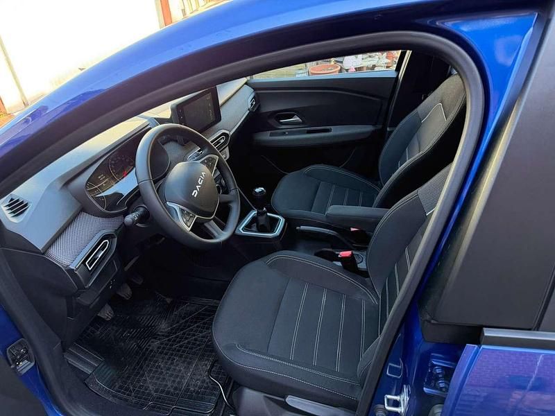 Gebraucht Dacia Sandero Expression 91 PS (66 kW) 2024 Stahlblau Kleinwagen