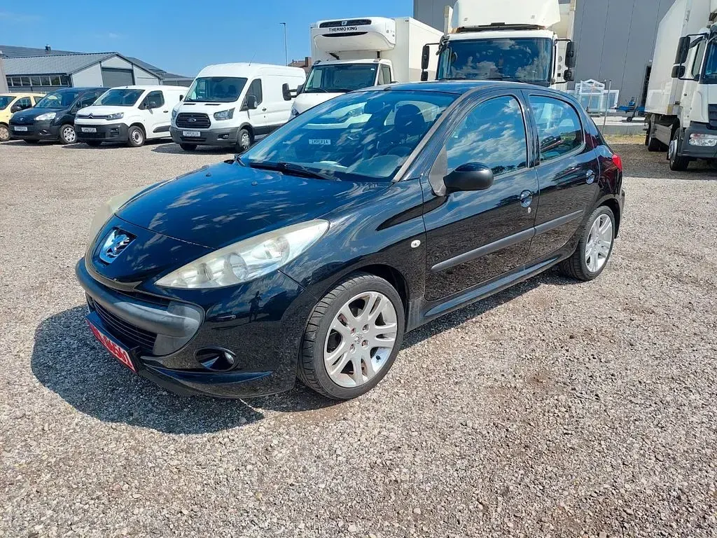 Gebraucht Peugeot 206+ 73 PS (53 kW) 2011 Schwarz Kleinwagen