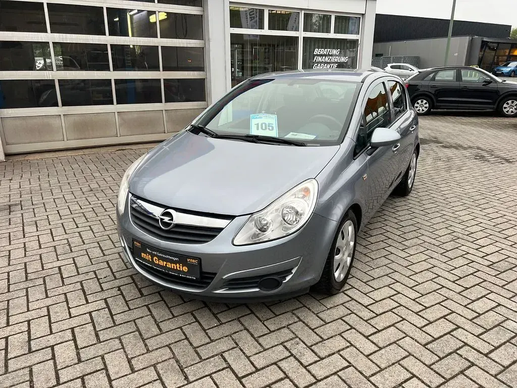 Używany Opel Corsa Edition 80 KM (58 kW) 2009 Srebrny Hatchback