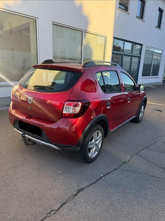 Gebraucht Dacia Sandero Stepway 90 PS (66 kW) 2015 Rot Limousine