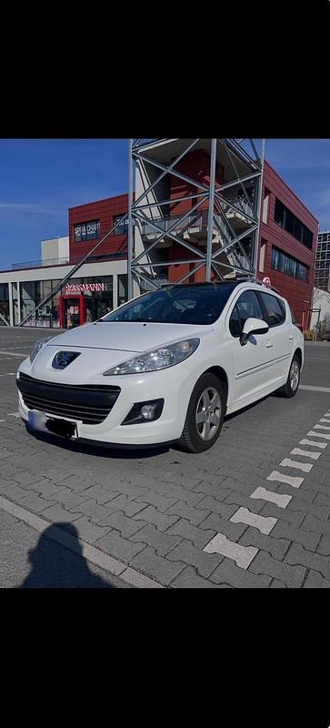 Gebraucht Peugeot 207 95 PS (69 kW) 2011 Weiß Kombi