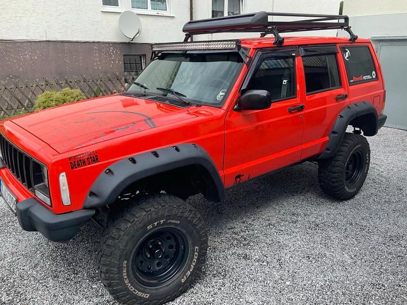 Rot Gebraucht 2001 Jeep Cherokee SUV | 7.450 € - Bild 1/4