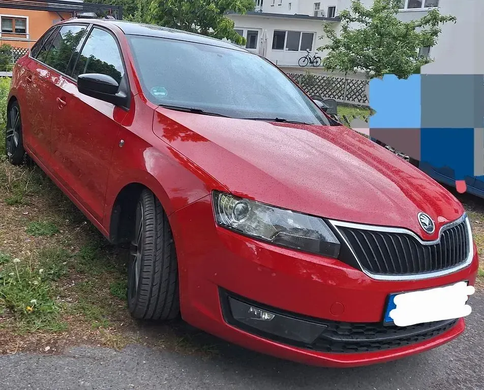 Używany Skoda Rapid Ambition 86 KM (63 kW) 2013 Czerwony Hatchback