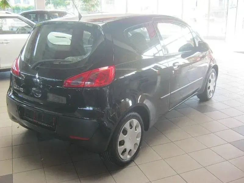 Gebraucht Mitsubishi Colt Inform 95 PS (69 kW) 2006 Cosmos schwarz Limousine