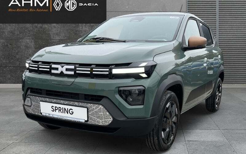 Gruen Neu 2024 Dacia Spring Extreme Kleinwagen | 16.850 € - Bild 1/4