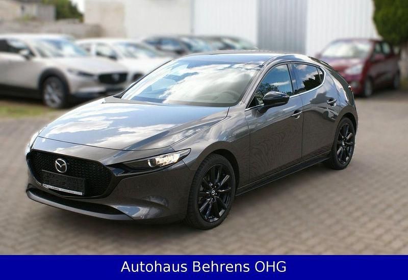 Grau Gebraucht 2024 Mazda 3 Homura-Line Limousine | 25.490 € (Teuer) - Bild 1/4
