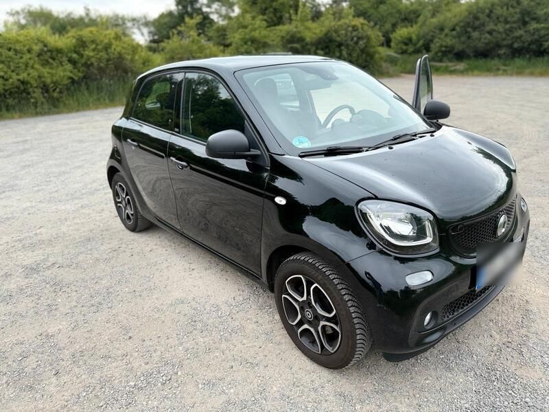 Schwarz Gebraucht 2017 Smart ForTwo Coupé Kleinwagen | 7.800 € - Bild 1/4