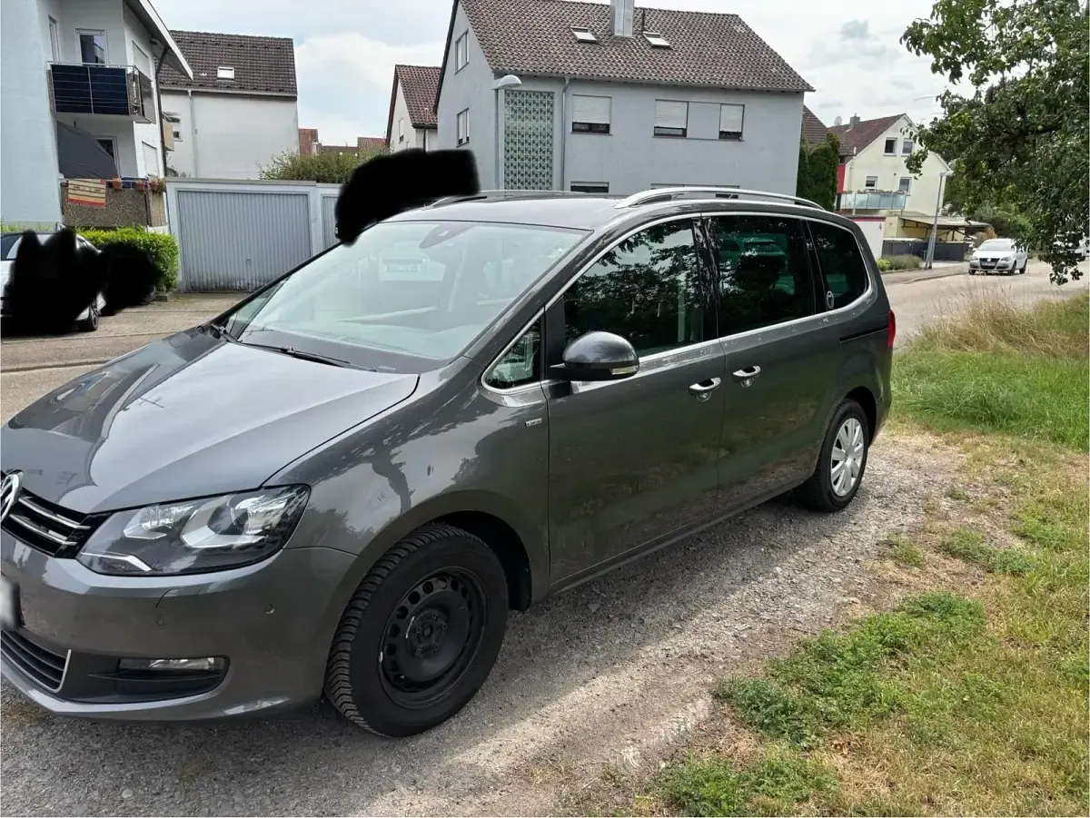 Second-hand VW Sharan 200 CP (147 kW) 2013 Gri Monovolum