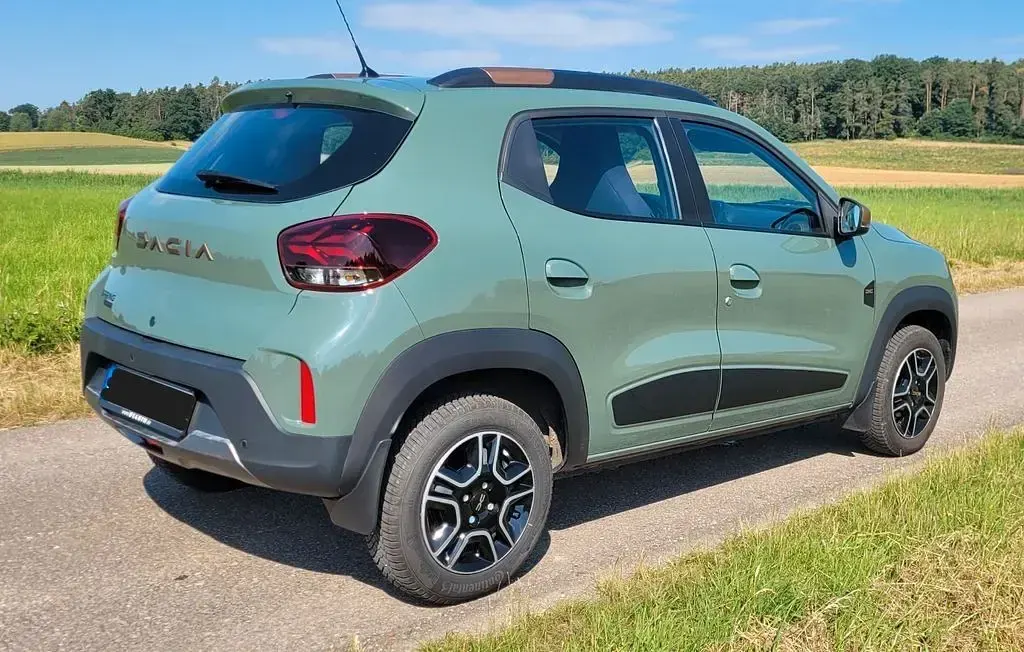 Gebraucht Dacia Spring Extreme 47 kW (65 PS) 2024 Grün Kleinwagen