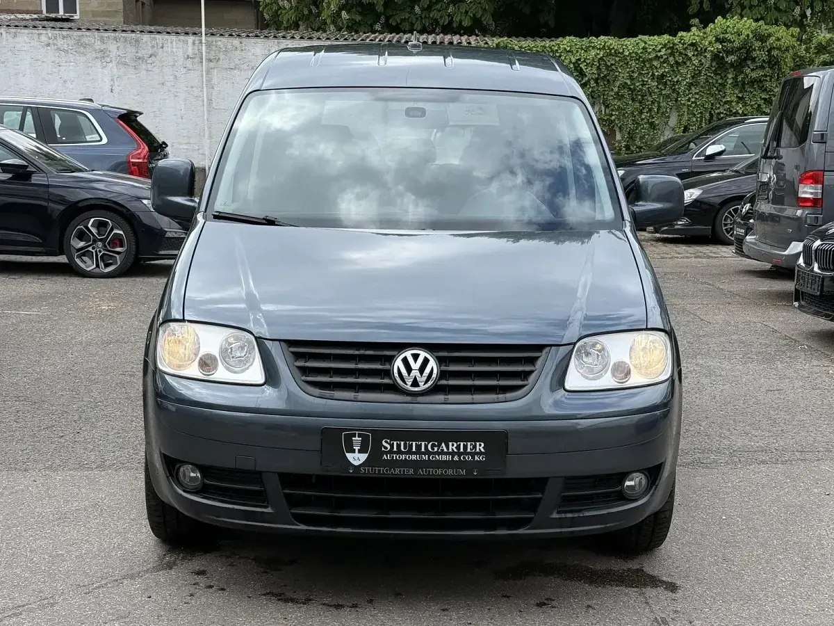 Second-hand VW Caddy Team 109 CP (80 kW) 2009 Gri Monovolum