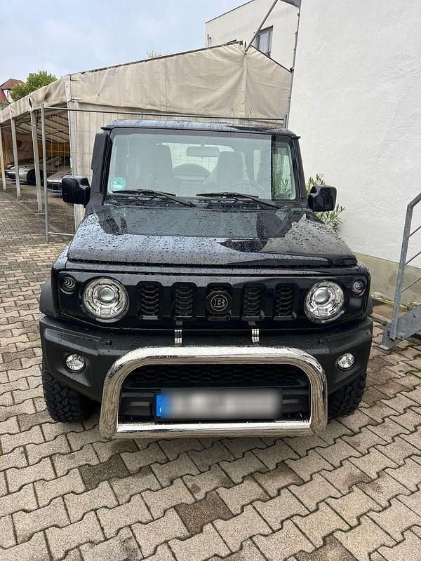 Schwarz Gebraucht 2024 Suzuki Jimny SUV | 38.999 € - Bild 1/4