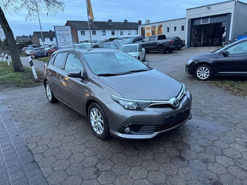Gebraucht Toyota Auris Hybrid 136 PS (100 kW) 2016 Braun Limousine