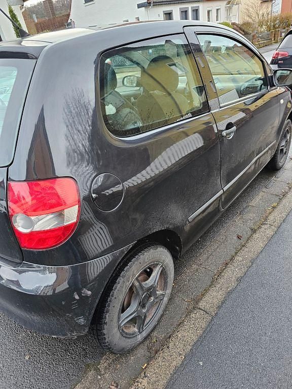 Gebraucht VW Fox 54 PS (39 kW) 2008 Schwarz Kleinwagen