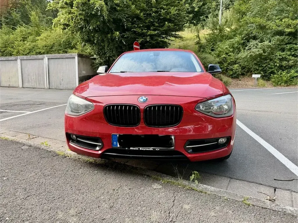 Gebraucht BMW 118 Sport Line 170 PS (125 kW) 2011 Rot Kleinwagen