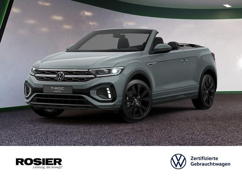Blau / petroleum blue (metallic) Gebraucht 2024 VW T-Roc Cabriolet R-line Cabrio | 34.990 € (Fairer Preis) - Bild 1/4