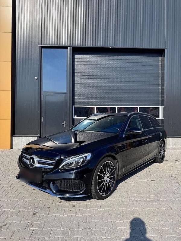 Schwarz Gebraucht 2015 Mercedes C220 AMG line Kombi | 16.375 € (Fairer Preis) - Bild 1/4