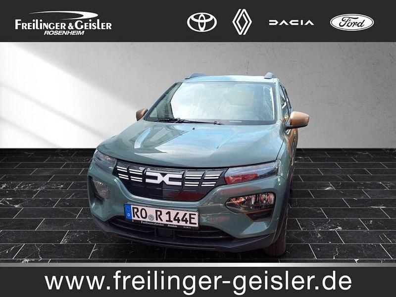 Grün flechtengrau Gebraucht 2023 Dacia Spring Extreme Kleinwagen | 15.990 € (Fairer Preis) - Bild 1/4