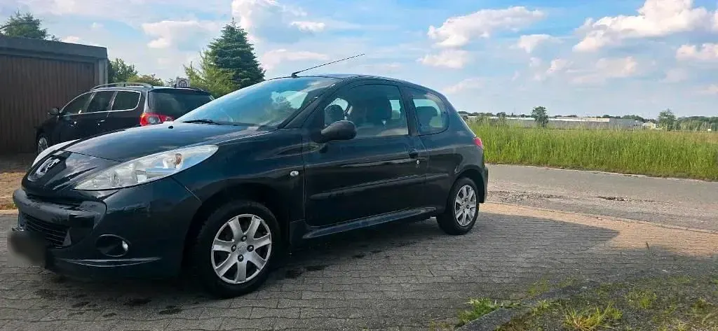 Gebraucht Peugeot 206+ 74 PS (54 kW) 2009 Grau Kleinwagen
