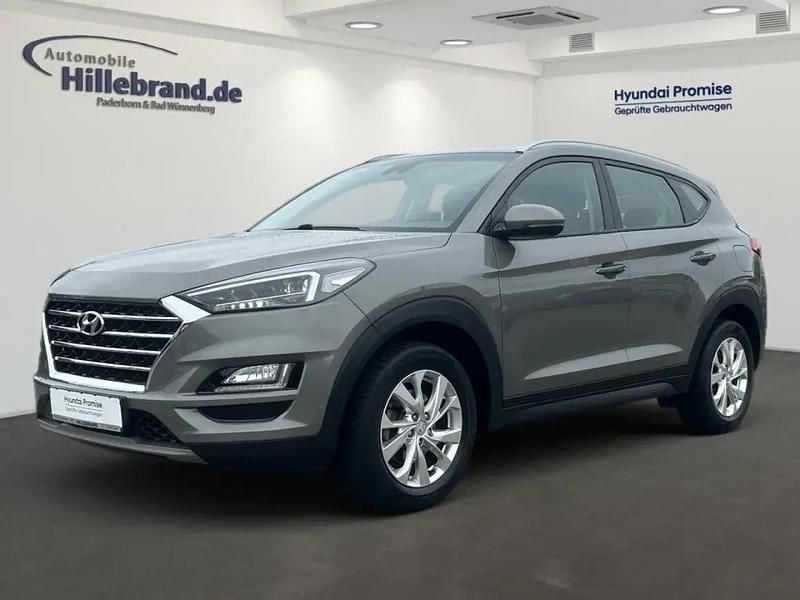 Olivine grey Gebraucht 2019 Hyundai Tucson Trend SUV | 15.990 € (Fairer Preis) - Bild 1/1