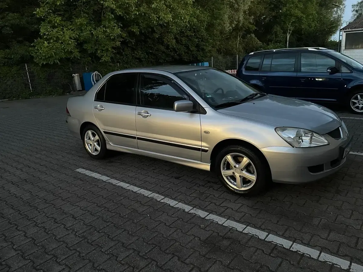 Gebraucht Mitsubishi Lancer 98 PS (72 kW) 2003 Silber Limousine