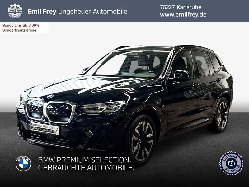 M carbonschwarz metallic Gebraucht 2023 BMW iX3 Sport Line SUV | 47.470 € (Guter Preis) - Bild 1/3
