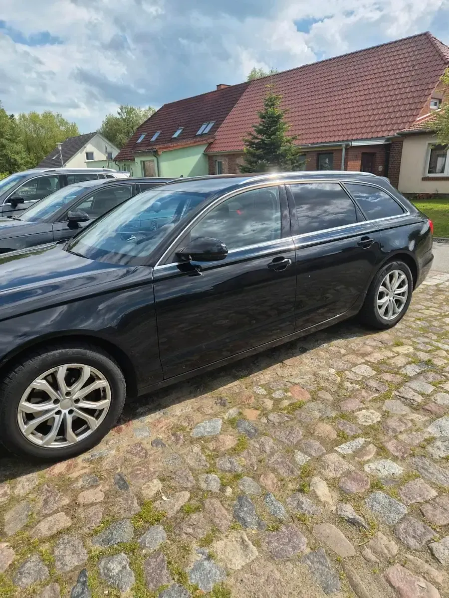 Używany Audi A6 136 KM (100 kW) 2014 Czarny Kombi