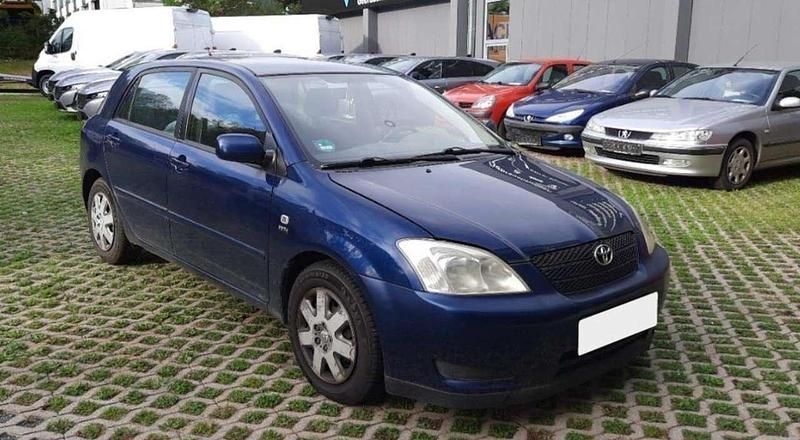 Dark blue mica metallic Gebraucht 2005 Toyota Corolla Kleinwagen | 2.300 € (Guter Preis) - Bild 1/4