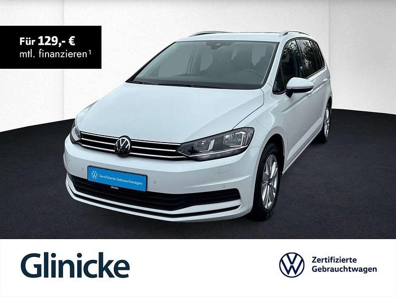Pure white Gebraucht 2024 VW Touran Comfortline Van / Kleinbus | 33.480 € (Fairer Preis) - Bild 1/1