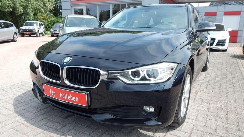 Schwarz ii Gebraucht 2013 BMW 316 Kombi | 14.580 € (Teuer) - Bild 1/4
