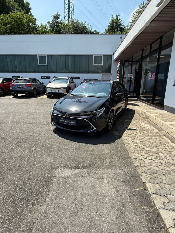 Mysticschwarz mica Gebraucht 2020 Toyota Corolla Basis Kombi | 24.360 € (Etwas zu teuer) - Bild 1/4