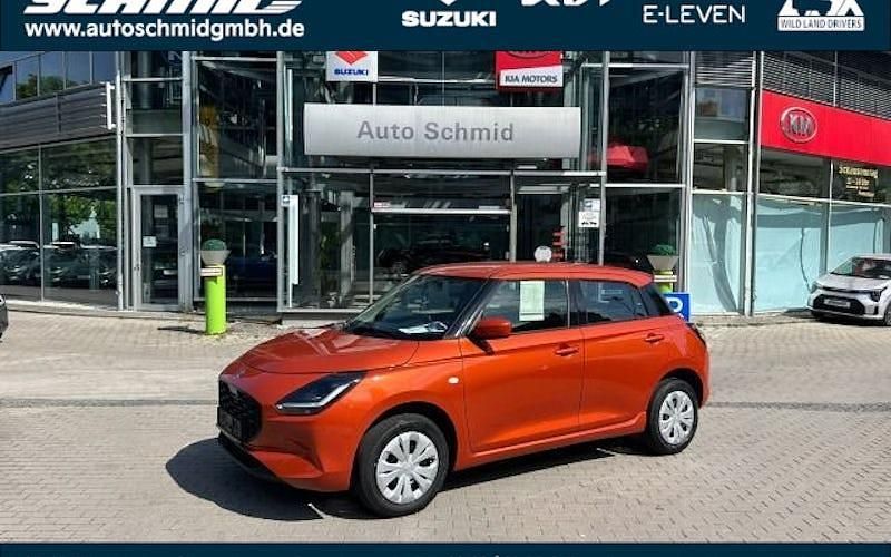 Orange Neu 2025 Suzuki Swift Club Limousine | 17.990 € - Bild 1/4