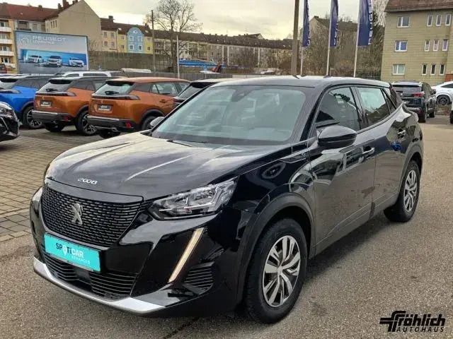 Perla nera metallic Gebraucht 2022 Peugeot e-2008 Active SUV | 17.490 € (Superpreis) - Bild 1/3