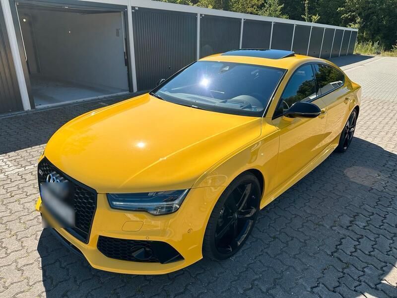 Gelb Gebraucht 2015 Audi RS7 Exclusive Kleinwagen | 49.999 € - Bild 1/2