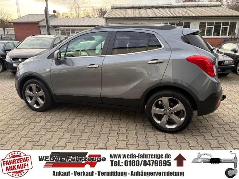 Gebraucht Opel Mokka Innovation 131 PS (96 kW) 2013 Seidengrau/lichtgrau/irongrey SUV