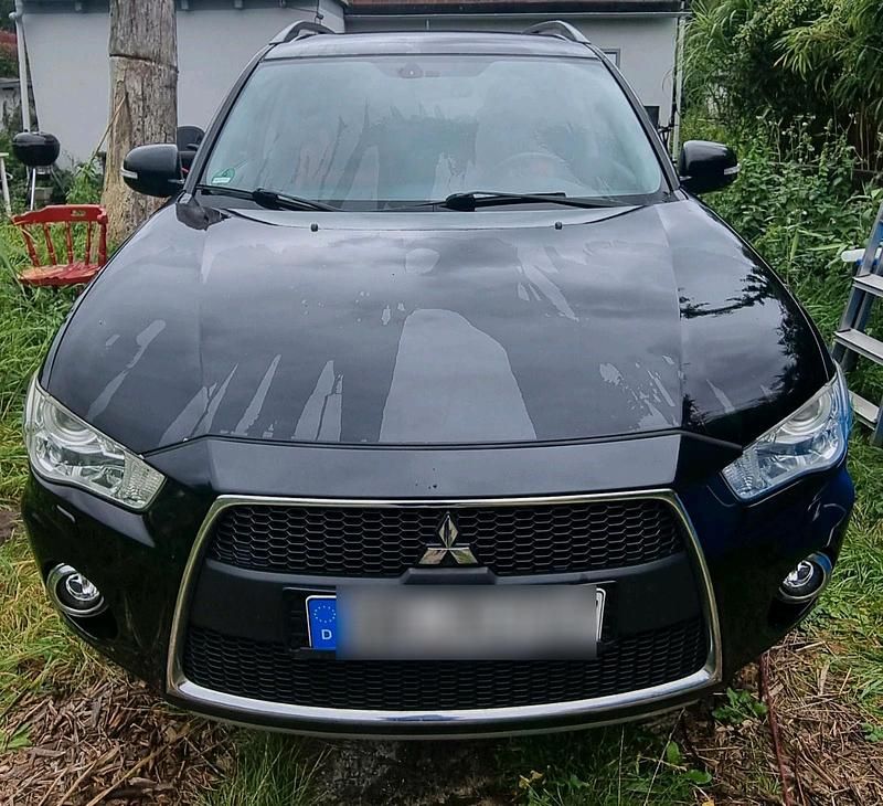 Schwarz Gebraucht 2013 Mitsubishi Outlander SUV | 5.986 € - Bild 1/4