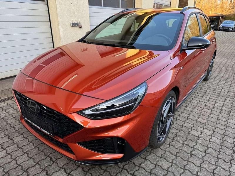 Jupiter orange metallic Gebraucht 2025 Hyundai i30 N Line Kombi | 25.250 € (Guter Preis) - Bild 1/4