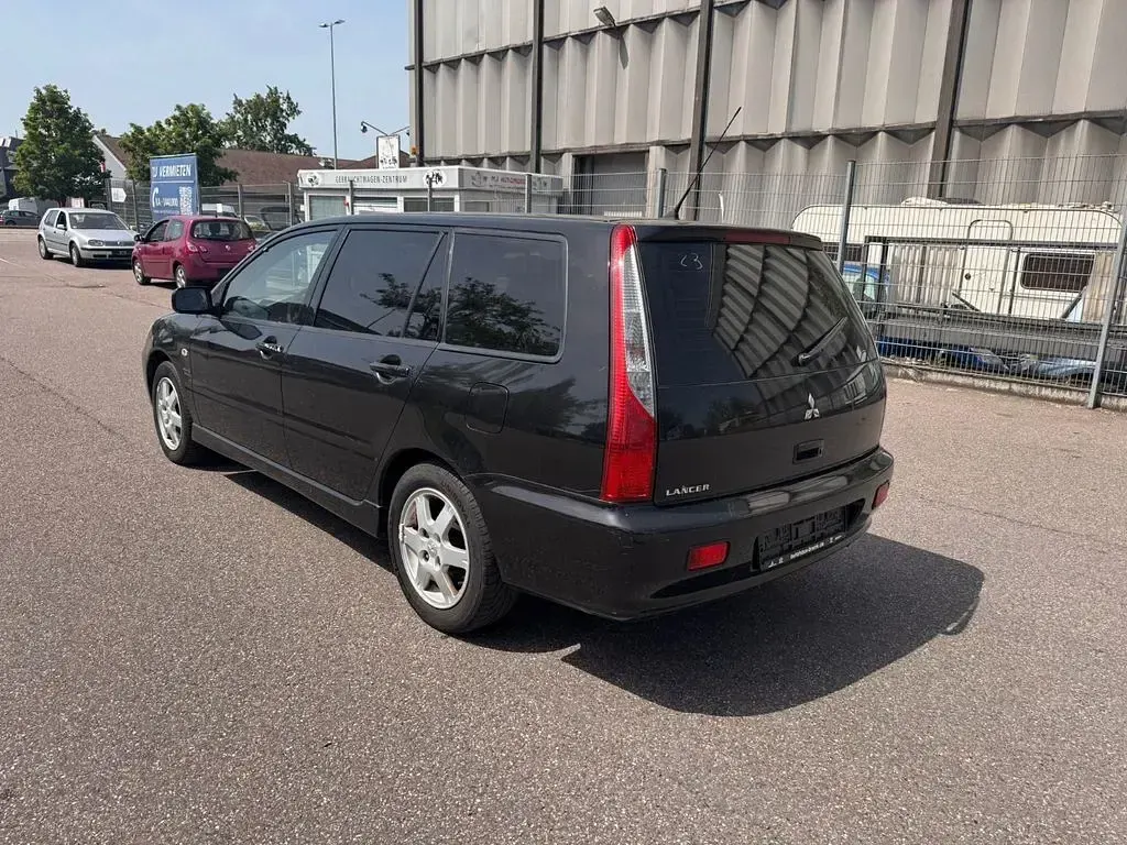 Gebraucht Mitsubishi Lancer 98 PS (72 kW) 2004 Schwarz Limousine