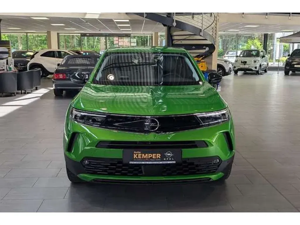 Gebraucht Opel Mokka-e Elegance 100 kW (136 PS) 2024 Matcha grün (metallic) SUV