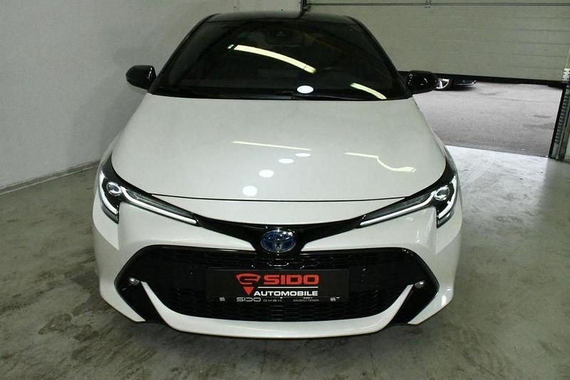 Gebraucht Toyota Corolla Hybrid Club 98 PS (72 kW) 2019 White pearl cs / black mica Limousine