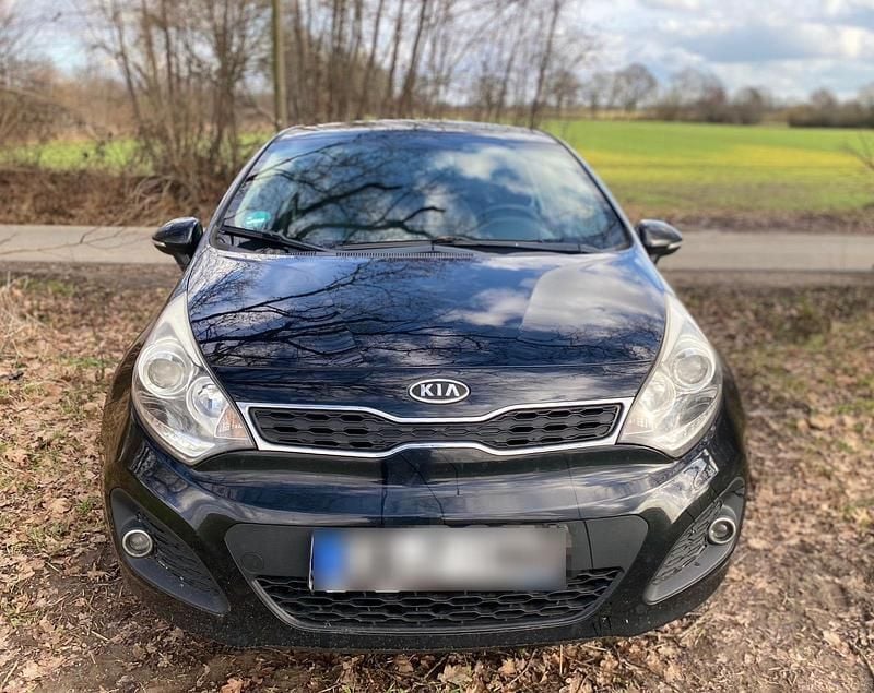 Gebraucht Kia Rio 90 PS (66 kW) 2012 Schwarz Kleinwagen